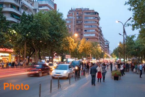 large-vecteezy_bustling-urban-street-scene-with-moving-cars-and-pedestrians_70074596_large