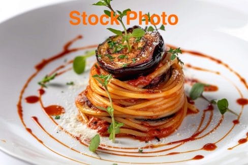02. vecteezy_a-plate-of-spaghetti-with-vegetables-and-sauce_47140079 copy