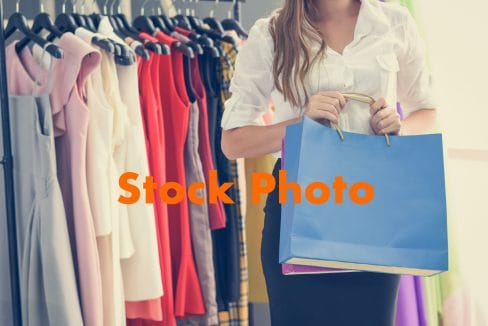 Boutique 02. vecteezy_woman-shopping-and-holding-shopping-bag-in-women-fashion_8369269 copy