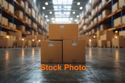2. vecteezy_stacked-cardboard-boxes-in-a-large-well-organized-storage_73308356 copy
